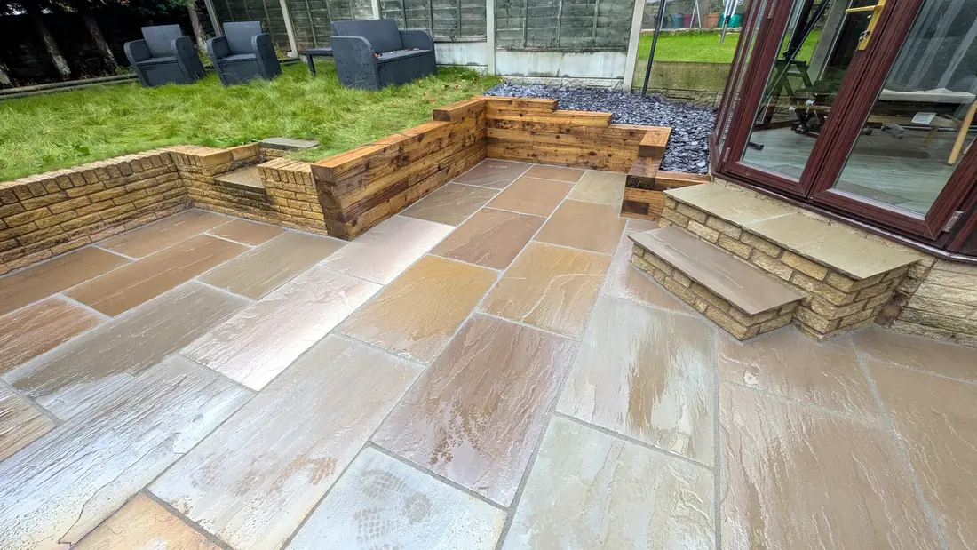 Indian stone paving with sleeper walls and steps by Pete Hughes Property Services