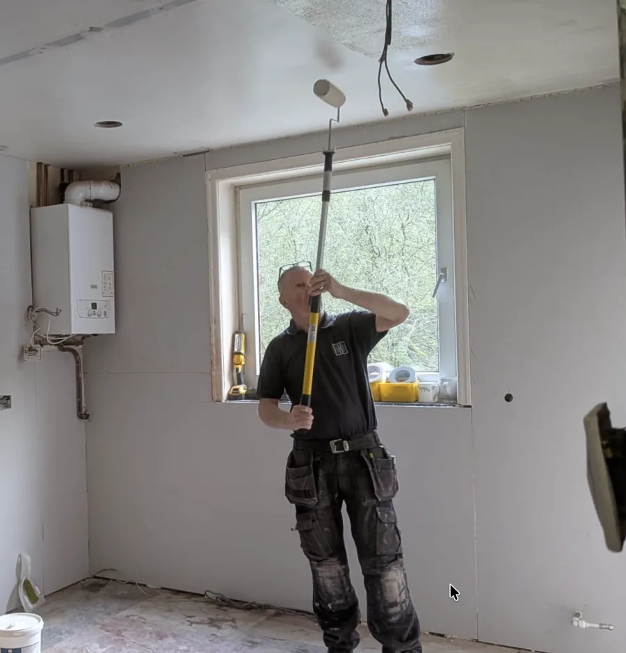 Glynn Hughes working on an interior renovation